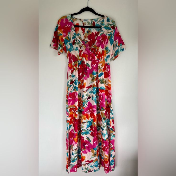 Reposh! This Bright Floral Patterned Dress Is Lightweight And Airy. It’s Short Sleeved With A Deep V-Neck And A Cinched Waist. It Comes With A Tie Belt To Add Some Flair. There Are Mid-Length Slits On Either Side. Reposhing Because It’s A Little Too Long For Me At 5’4”. Brand New With Tags, Never Worn. Spring Printed Short Sleeve Maxi Dress, Spring Printed Maxi Dress With Short Sleeves, Spring Short-sleeve Printed Maxi Dress, Daywear Floral Print Midi Dress With Short Sleeves, Spring Vacation Short Sleeve Maxi Dress, Multicolor Short Sleeve Floral Dress For Summer, Floral Print Short Sleeve Rayon Dress, Short Sleeve Multicolor Floral Dress For Summer, Pink Rayon Summer Maxi Dress