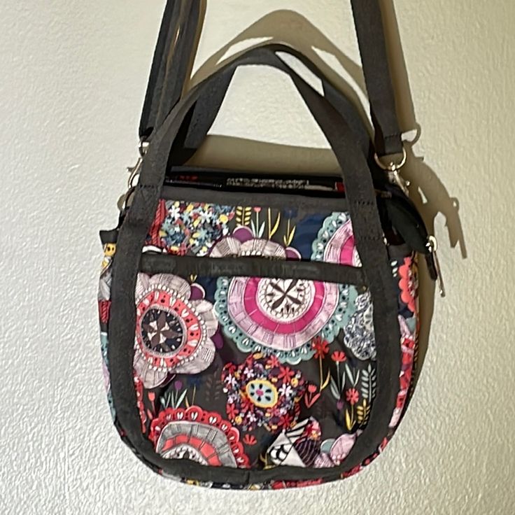 Very Cute Lesportsac Cross-Body Bag. Perfect Condition, Like New And Never Used. Approximately 9“ Across X 9” Tall. Trim Is Brown, Strap Is Adjustable. Functional Multicolor Crossbody Shoulder Bag, Functional Multicolor Crossbody Bag, Casual Pink Satchel For On-the-go, Sporty Multicolor Bag With Adjustable Strap, Multicolor Sporty Bags For Everyday, Sporty Multicolor Everyday Bags, Like New, Crossbody Bag, Bag Lady