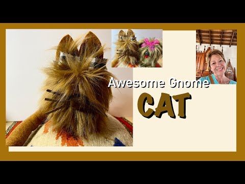 there is a cat that has been made out of yarn and it's hair