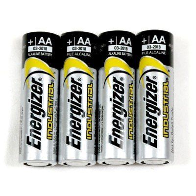 four piles of energizer batteries on a white background