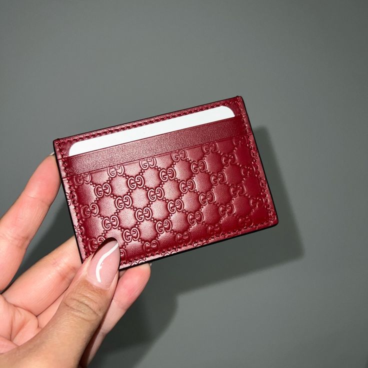 New Gucci Red Cardholder Will Come With Dust Bag, Box And A Black Shopping Bag 100% Authentic I Think This Is Also Unisex And Everyone Can Use It. Designer Red Wallet With Interior Card Slots, Designer Red Wallets With Interior Card Slots, Luxury Red Wallets With Interior Card Slots, Red Rectangular Wallet, Luxury Red Wallet With Original Box, Designer Red Rectangular Wallet, Designer Red Bags With Card Slots, Luxury Red Leather Wallet, Luxury Gucci Wallets With Interior Card Slots