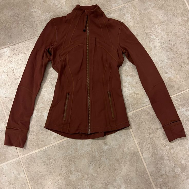 Washed But Never Worn Lulu’s Most Popular Jacket.. Rich Brown Color. Fitted Athleisure Outerwear For Outdoor Activities, Fitted Fall Sports Outerwear, Brown Athleisure Activewear For Fall, Brown Activewear For Workout In Fall, Brown Activewear For Fall Workout, Fitted Activewear For Outdoor In Fall, Fitted Activewear For Fall Outdoor Activities, Fitted Activewear With Pockets For Fall, Fitted Brown Activewear For Fall