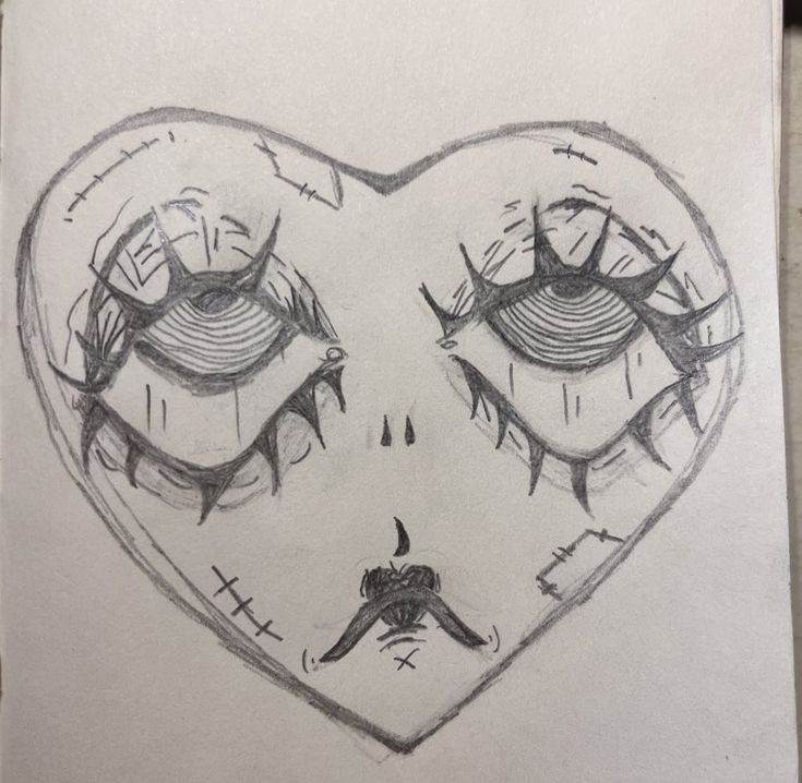 a drawing of two eyes in the shape of a heart