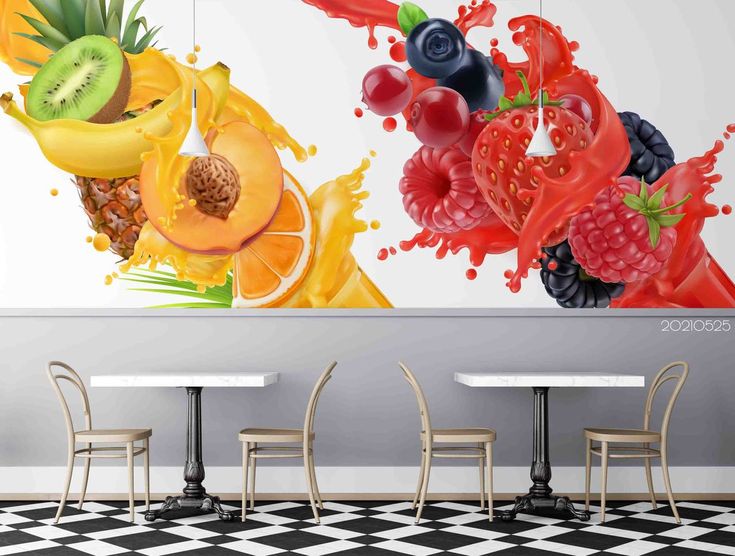 a wall mural in a restaurant with fruit and berries on it's side, next to two chairs