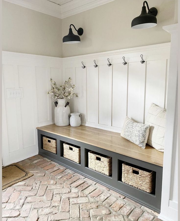 a bench with baskets on it in a room