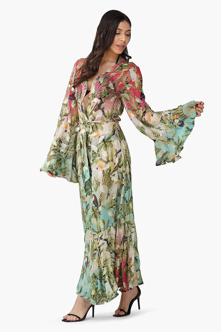 Sheer swim cover-up Printed lurex viscose georgette Front open Maxi length Full sleeves with ruffles Ruffles at the hem Soak up the sun in style with the Tropical Toucan Front Open Cover Up! This sheer swim cover-up is a statement piece that's as playful as it is chic.Made from printed Lurex viscose georgette, it features a vibrant tropical design that feels both fresh and flirty. The front open design and full sleeves with ruffles add a dramatic flair, while the ruffles at the hem give it an ec Chasing Sunsets, Leopard Bag, Soak Up The Sun, Sweet Escape, Beach Collection, Tropical Design, Beach Getaways, Open Design, Swim Cover