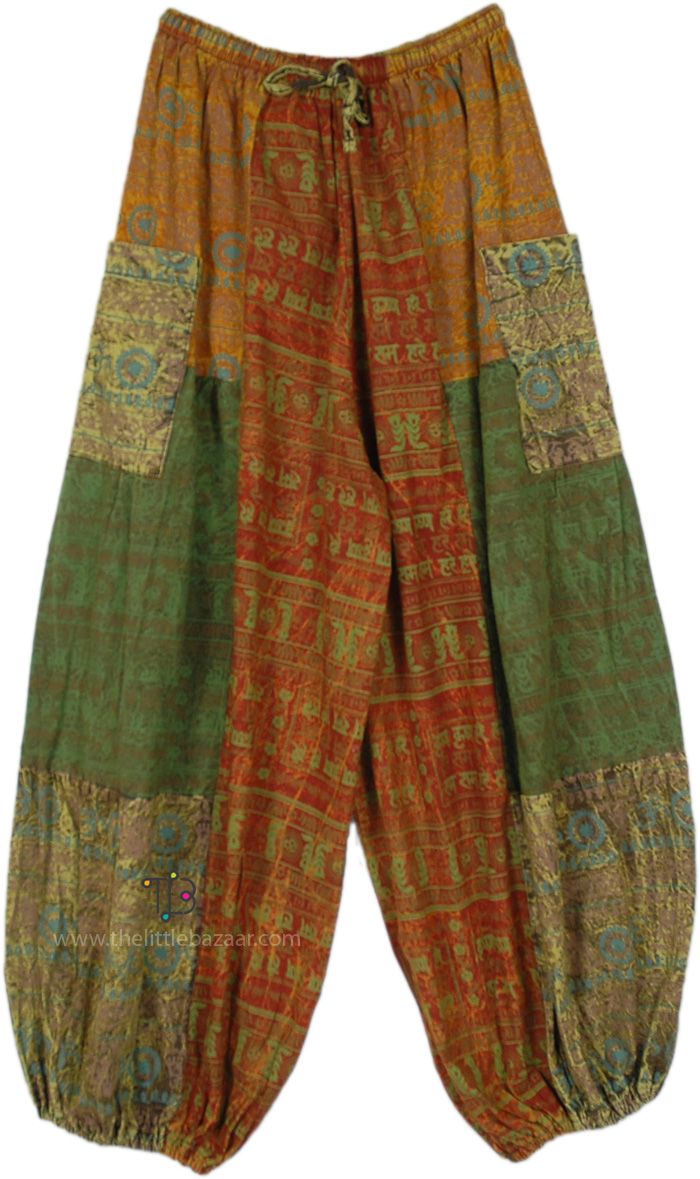 A pair of tropical bohemian handmade hippie print balloon style harem pants.  These pants feature a mesmerizing hippie-inspired print and style that channels the free-spirited vibes of the 60s and 70s. #tlb #SplitSkirtsPants #Patchwork #bohemianfashion #Handmade #Patchworkcottonpants #hippieharempants Patchwork Harem Pants, Multicolor Hippie Harem Pants For Spring, Hippie Multicolor Harem Pants For Spring, Multicolor Bohemian Pants With Boho Print, Green Baggy Harem Pants In Hippie Style, Hippie Harem Pants With Pockets, Multicolor Harem Pants With Pockets, Baggy Green Hippie Harem Pants, Multicolor Hippie Harem Pants With Pockets