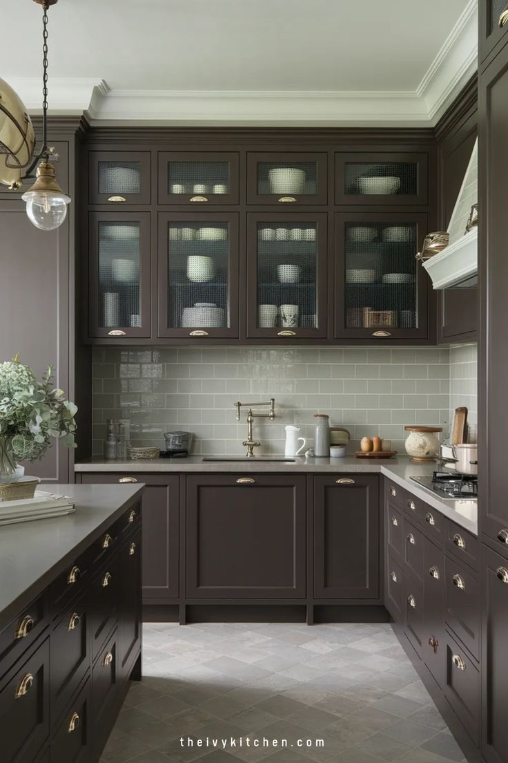 a kitchen filled with lots of brown cupboards and counter top space next to a sink