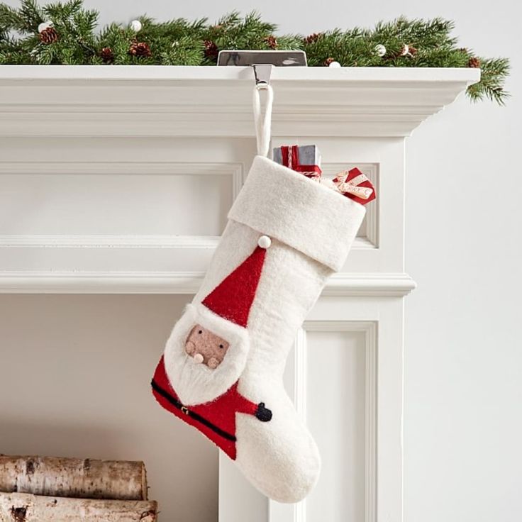 Bring classic, minimal style to your mantel this holiday with this plush stocking collection. It's made from pure wool and can be personalized with a name so little ones know where to find their treats come Christmas morning. Designed in collaboration with west elm. DETAILS THAT MATTER Made of 100% wool. Red stocking with White felt cuff. White stocking with White felt cuff. Made in a Fair Trade Certified(TM) factory, supporting fair and safe labor practices and empowering workers to invest in t Modern Christmas Stocking, Felt Christmas Stockings, Cookie Cakes, Crochet Christmas Stocking, Felt Stocking, Modern Christmas Decor, Holiday Craft, Christmas Things, Xmas Stockings