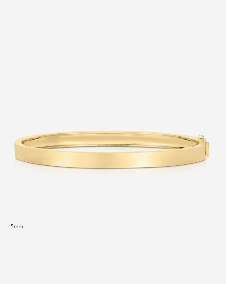 The must-have piece for any wrist stack, these solid gold bangles are available in 3 widths to layer up or wear alone. Solid Gold Bangle, Wrist Stack, Necklace Length Guide, Wrist Stacks, Bracelet Size Chart, Kids Rings, Kids Bracelets, Size Chart For Kids, Kids Earrings