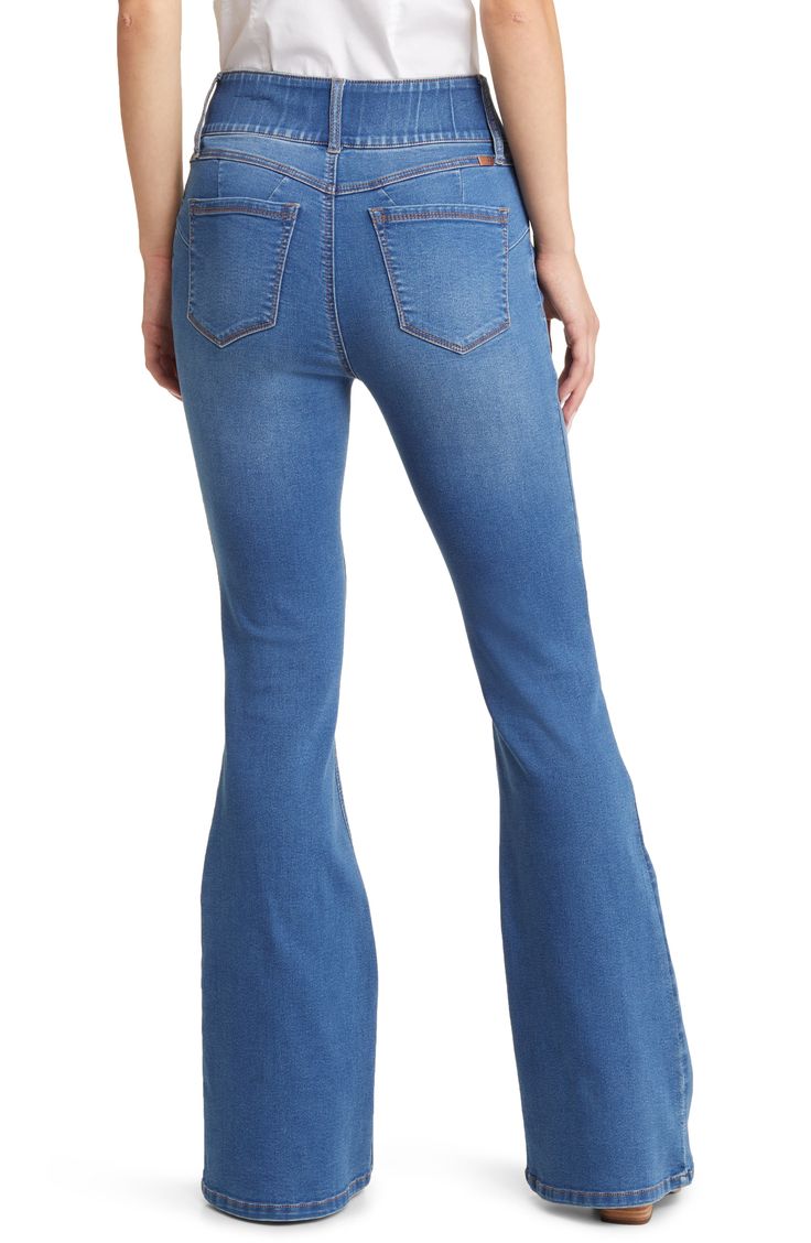 These soft and stretchy flare jeans feature a high, wide waistband with a shapewear effect that comfortably contours your natural silhouette. 34" inseam; 23" leg opening; 10 1/2" front rise; 15" back rise 51% cotton, 26% polyester, 22% rayon, 1% spandex Machine wash, tumble dry Imported Medium Wash Stretch Denim Flares, Stretch Medium Wash Denim Flares, Stretch Denim Flares In Medium Wash, Medium Wash High Waist Stretch Flare Jeans, Stretch Medium Wash Jeans With Flare, High Waist Stretch Flare Jeans In Medium Wash, Casual Dark Wash Flared Hem Bottoms, Trendy Stretch Jeans With Flared Hem, Stretch High Rise Medium Wash Flares