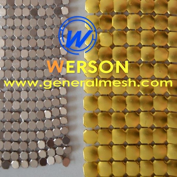 two pieces of metal mesh with different colors and sizes on each side, one is yellow and the other is silver