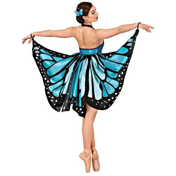 a woman in a blue butterfly costume is dancing with her arms spread out to the side