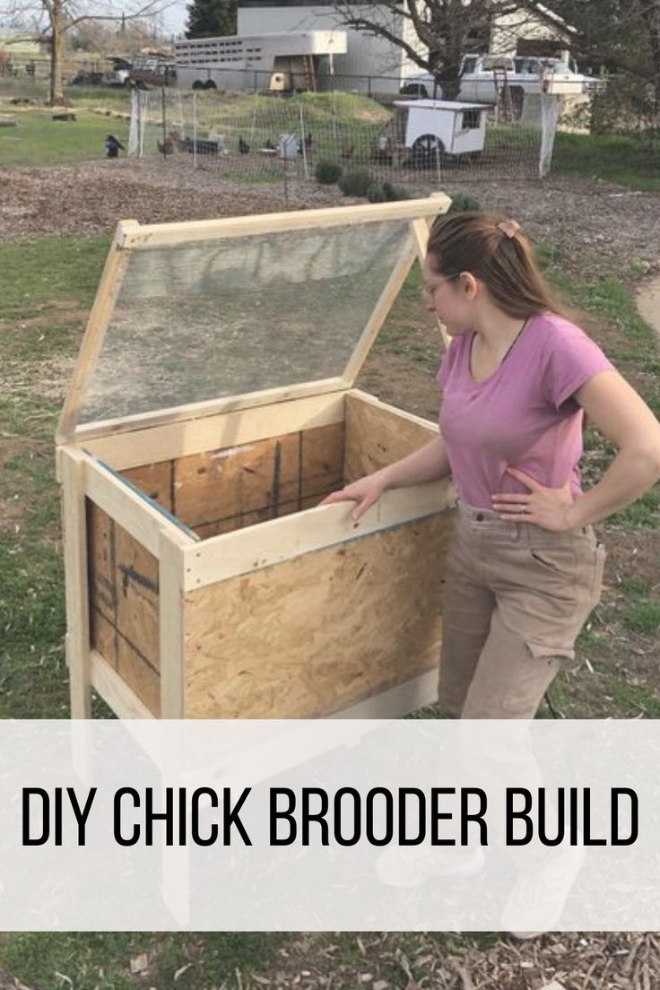 a woman standing next to a wooden box with the words diy chick broader build