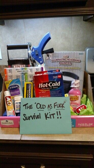 the old as puck survival kit is on display in a kitchen cabinet with a sign that says, the old as puck survival kit