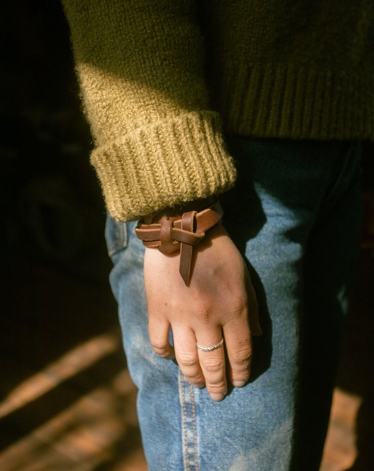 The Leather Knot bracelet is simple but elegant and fits right in at any occasion. Both the dark brown and natural versions age subtly and over time develop a beautiful patina unique to each person. It's no surprise this is our best-selling piece. "I appreciate the usefulness and beauty of knots and braiding incorporated in horse tack, especially the intricacy of Argentine gaucho saddlery. The knot bracelet is a simple, yet intriguing way to wear a piece of the west everyday." -Madi Phillips, Le Brown Leather Strap Bracelet, Adjustable Brown Bracelet, Adjustable Brown Bracelets For Everyday Use, Rustic Leather Bracelets For Everyday, Adjustable Rustic Bracelet In Distressed Brown, Rustic Adjustable Bracelet In Distressed Brown, Adjustable Vintage Brown Bracelets As Gift, Adjustable Vintage Brown Bracelet As Gift, Classic Adjustable Brown Bracelets