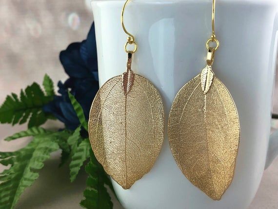 #jewelry #earrings #dangledropearrings #leafearrings #24kgoldearrings #botanicalearrings #bridalearrings #bridaljewelry #weddingearrings #natureearrings #filigreeearrings #statementearrings #giftforher #spotlightjewelry #24kgoldvermeil #sterlingsilverhook Nature-inspired Gold Jewelry With Matching Earrings, Nature-inspired Gold Earrings With Ear Wire, Gold Leaf-shaped Earrings, Nature-inspired Gold Earrings, Gold Leaf-shaped Nature-inspired Earrings, Gold Leaf Nature-inspired Earrings, Nature-inspired Gold Leaf Earrings, Elegant Leaf Shaped Earrings As Gift, Elegant Leaf-shaped Earrings For Gift