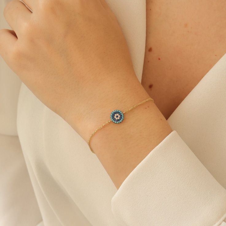 Evil Eye Bracelet in 14K Solid Gold,Blue Protection Bracelet, Mini Evil Eye Chain Bracelet, Minimalist Design Nazar Bracelet, Gift For Her Evil eye jewelry is that they are designed to protect the wearer from evil and ward off the evil that has been directed at them. Wearing any piece of jewelry with the evil eye symbol on it provides the wearer with both power and protection against evil spirits or bad luck. Material: Solid Gold (Not Gold Filled or Gold Plated) Karat: 14K (real gold stamp 585) Elegant Round Chain Bracelet With Evil Eye, 14k Yellow Gold Evil Eye Bracelets, Elegant Round Evil Eye Chain Bracelet, 14k Gold Bracelets With Adjustable Chain, Elegant Round Beaded Bracelets With Evil Eye, 14k Gold Bracelets With Evil Eye, 14k Gold Round Beaded Bracelets For Fine Jewelry, Fine Jewelry 14k Gold Round Beaded Bracelets, Round 14k Gold Beaded Bracelets Fine Jewelry