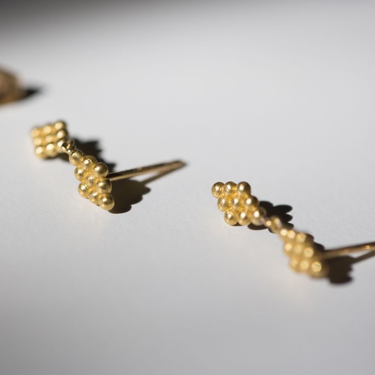 Catbird is proud to debut the work of Prounis, a new jeweler with an old soul. Her modern jewels are inspired by antiquity; each piece is hand wrought from rich, luxurious 22k gold.The Duo Nona Earring is named for the Latin term meaning having nine, which also denotes the number of granules in each link. Versatile enough for you or your Nonna. Sold as singleswe love them in a second or third hole!Prounis jewels are made with a custom shade of the ancient 22-karat alloy; 22-karat gold has a vibr Luxury Gold Cluster Earrings In Sterling Silver, Elegant Gold Cluster Earrings For Gift, Pierced 14k Yellow Gold Cluster Earrings, 14k Yellow Gold Cluster Earrings, Pierced, Elegant Yellow Gold Cluster Earrings As Gift, 14k Yellow Gold Pierced Cluster Earrings, Yellow Gold 14k Pierced Cluster Earrings, Gold Cluster Earrings For Celebrations, Gold Cluster Earrings For Formal Events