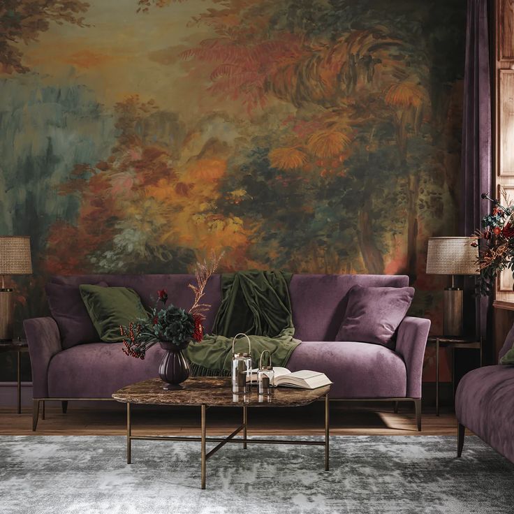 a living room filled with furniture and a large painting on the wall above it's couches