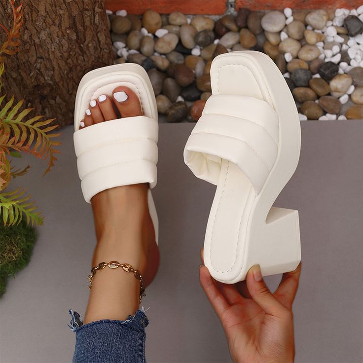 Shipping: Worldwide Express Shipping AvailableDelivery time: 7-15Days Fast ShippingReturns: Fast refund, 100% Money Back Guarantee.SPECIFICATIONSBrand Name: FEILUOMANShoes Type: Modern SlippersApplicable Place: outsideUpper Material: PUHeel Height: High (5cm-8cm)Origin: Mainland ChinaCN: ZhejiangSeason: SummerHeel Type: Hoof HeelsItem Type: slippersFashion Element: PlatformDepartment Name: ADULTOutsole Material: RubberWith Platforms: YesPlatform Height: 0-3cmStyle: NoveltyInsole Material: PUPatt White Round Toe Block Heels For Spring, Trendy White Open Heel Wedge Sandals, Trendy White Wedge Heels, Casual White Block Heel Shoes, White Mules With Padded Heel For Beach, White High Heel Mules For Beach, White High Heel Mules For The Beach, Trendy White Block Heels With Round Toe, White Wedge Heel Sandals With Padded Heel