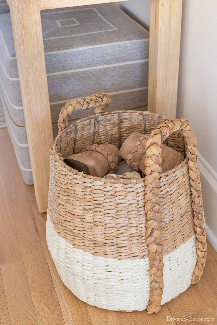 Woven basket filled with shoes Entry Shoe Basket, Shoe Basket By Door Entryway, Entryway Basket Storage, Basket Entryway Decor, Basket Shoe Rack, Baskets For Shoes Entryway, Entry Way Baskets, Basket Shoe Storage, Entryway Shoe Bench Ideas