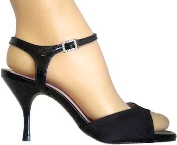 a woman's black high heeled shoes with ankle straps