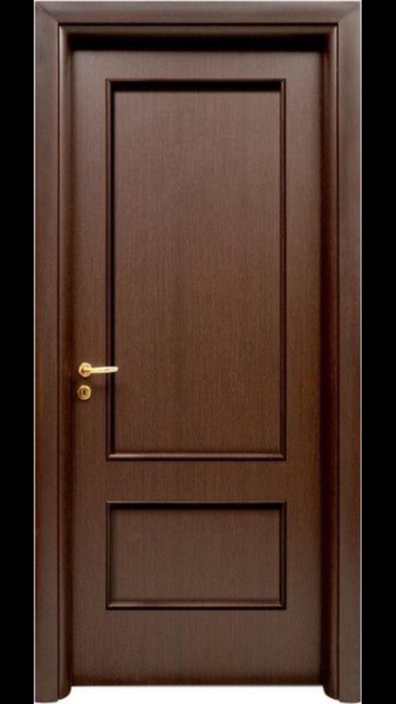 a wooden door with a metal handle on the front and side panels, in dark wood