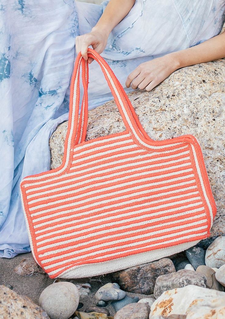 [Color: Pink/Natural] A handwoven striped cotton tote bag. With double strap handles and a wide carry all size. Casual Striped Rectangular Straw Bag, Striped Tote Beach Bag For Everyday, Everyday Striped Tote Beach Bag, Casual Bags With Striped Lining For Vacation, Casual Vacation Bag With Striped Lining, Casual Vacation Bags With Striped Lining, Summer Striped Rectangular Bags, Summer Striped Shoulder Bag For Everyday, Striped Tote Bag For Vacation