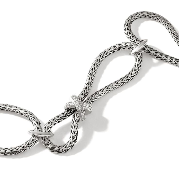 Unique, elegant, and modern, this John Hardy chain collection diamond knife edge mini chain bracelet is the perfect way to bring together modern design and timeless style! The John Hardy Chain Collection is a refreshing alternative to classic sterling silver jewelry. Modern, intriguing, and creative, Chain Collection pieces bring character and personality to any outfit they accessorize. Established in Bali in 1975, John Hardy is dedicated to the creation of ultimate beauty through artisan handcr John Hardy, Engraved Items, Diamond Bracelets, Diamond Stone, Silver Diamonds, Pave Diamonds, Chain Bracelet, Handcrafted Jewelry, Custom Jewelry