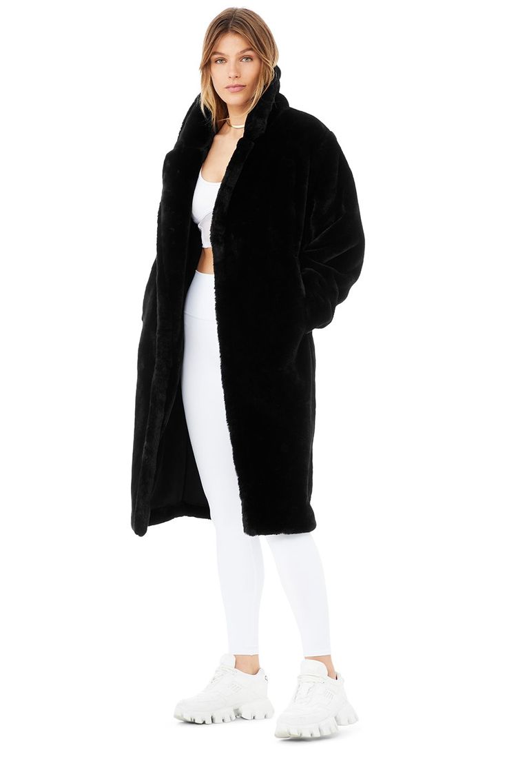 The new, insanely soft & touchable Oversized Faux Fur Trench takes the beloved silhouette of our Oversized Sherpa Trench and remixed it in the softest faux fur you’ve ever felt, with an open front, zippered pockets, a notched collar and sleek, satiny lining. Keep this classic on hand all season long and layer over your fave hoodie for some street edge. Luxe faux fur with satiny interior lining Open front, zippered pockets & notched collar Designed & uniquely fit for every size Wear-t Alo Yoga Fall Outerwear In Solid Color, Chic Oversized Faux Fur Coat, Cozy Long Sleeve Alo Yoga Outerwear, Alo Yoga Cozy Long Sleeve Outerwear, Fall Outerwear With Faux Fur For Loungewear, Oversized Faux Fur Long Coat, Cozy Alo Yoga Loungewear Outerwear, Alo Yoga Oversized Long Sleeve Outerwear, Alo Yoga Winter Loungewear Outerwear