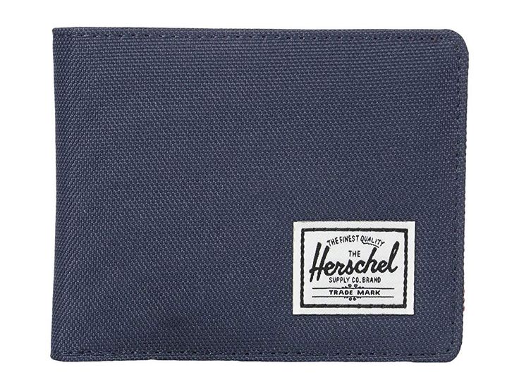 Herschel Supply Co. Roy RFID - Wallet Handbags : Navy/Red : Over-thinking your wallet situation? Don't fret, the simple and functional Herschel Supply Co. Roy RFID wallet has you covered! RFID protection. Classic textile bi-fold wallet. Currency sleeve and multiple credit card slots. Woven logo patch adorns front. Engineered red and white striped tab. Imported. Measurements: Bottom Width: 4 1 2 in Depth: 1 in Height: 3 3 4 in Handle Drop: 4 in Weight: 1.8 oz Casual Bifold Wallets With Coin Pocket, Casual Bifold Wallet With Coin Pocket, Casual Bifold Wallet For Everyday Use, Casual Everyday Trifold Wallet, Casual Bifold Wallet With Card Slots, Casual Wallets With Card Slots, Blue Casual Wallets With Rfid Blocking, Casual Blue Wallets With Rfid Blocking, Casual Blue Rfid Blocking Wallets