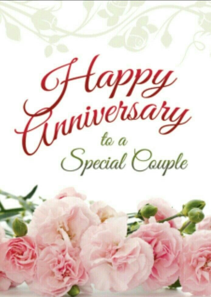 happy anniversary to a special couple with pink flowers on the side and green leaves in the middle