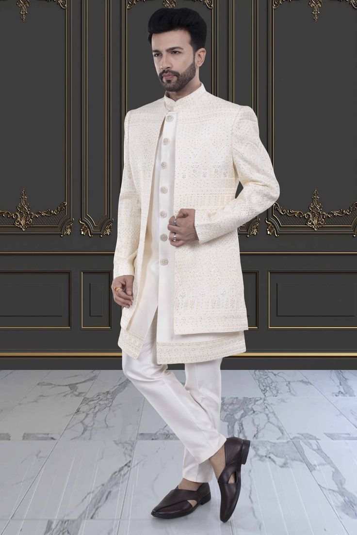 Indulge in luxury and sophistication with our Mens Sherwani- U2-S382. This open jacket sherwani is perfect for special occasions, showcasing your refined and elegant taste. Elevate your style and make a statement with this premium piece. Elegant Semi-formal Sets For Eid, Elegant Front Open Sets With Dabka Work, Luxury Bandhgala For Groom, Elegant Front Open Kurta For Festive Occasion, Elegant Festive Outerwear With Dabka Work, Elegant Front Open Sets For Eid, Elegant Cream Bandhgala With Chikankari Embroidery, Elegant Front Open Kurta For Eid, Elegant Front-open Kurta With Zari Work