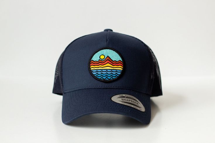 Mountains - Trucker Hat - Navy Blue 65/35 polyester/cotton Mesh back, structured Mid-profile, six-panel Snapback closure Blue Cotton Trucker Snapback Hat, Navy Adjustable Baseball Cap For Summer, Fitted Flat Brim Baseball Cap For Outdoor, Fitted Flat-brim Baseball Cap For Outdoor, Navy Trucker Hat With Curved Brim, Blue Six-panel Trucker Hat For Summer, Navy Adjustable Trucker Hat With Curved Brim, Navy Snapback Hat With Curved Brim For Outdoor, Fitted Trucker Hat With Curved Brim For Outdoor