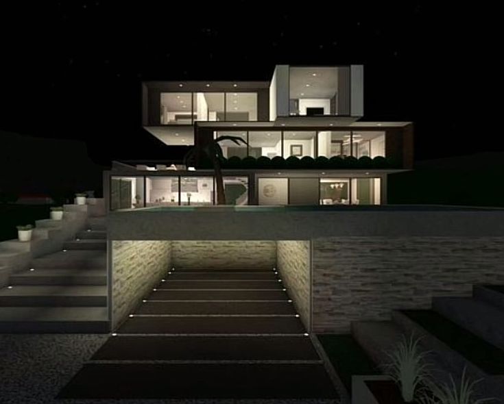 an image of a house at night with stairs leading up to it