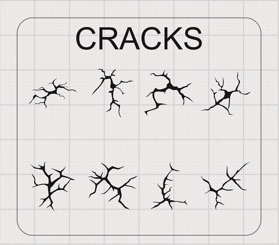 an image of cracks on a white sheet with the words cracks in black letters