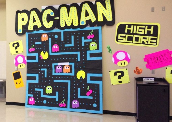 pac - man high score bulletin board on the wall