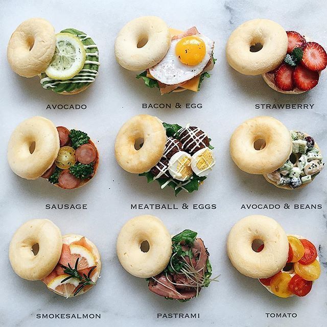 the doughnuts have different types of toppings and are arranged in order to look like donuts