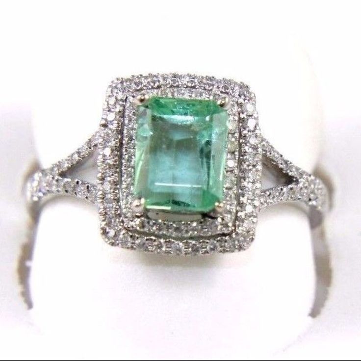 This Is A Fine Light Emerald Solitaire Ring W/Diamond Halo & Accents. It Is Made Of 100% Natural 14kt White Gold And Is In Brand New Condition. It Has A Ctw Of 1.53ct (0.27 Diamond/1.26 Emerald) And Weighs 3.0 Grams. The Fancy Diamonds Have A Clarity Of Si1 And F Color. This Beautiful Custom Piece Has An Excellent Emerald Cut Emerald Stone, Surrounded By A Diamond Halo With Accents. This Ring Is The Latest In Fashion Design Having Unique Designer Qualities That Is Full Of Shine And Clarity. Emerald Solitaire Ring, Electroformed Ring, Double Heart Ring, Sterling Silver Stackable Rings, Luxury Wedding Rings, Fish Ring, Gemstone Rings Vintage, Stackable Rings Silver, Sterling Silver Wedding Rings