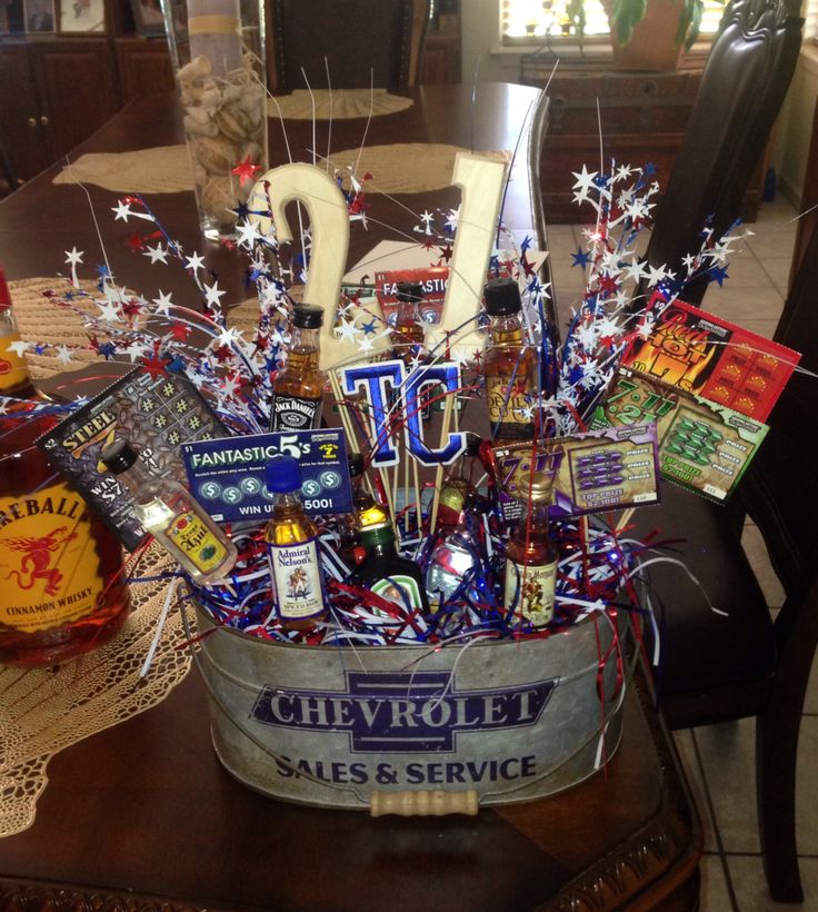 a bucket filled with lots of items on top of a table