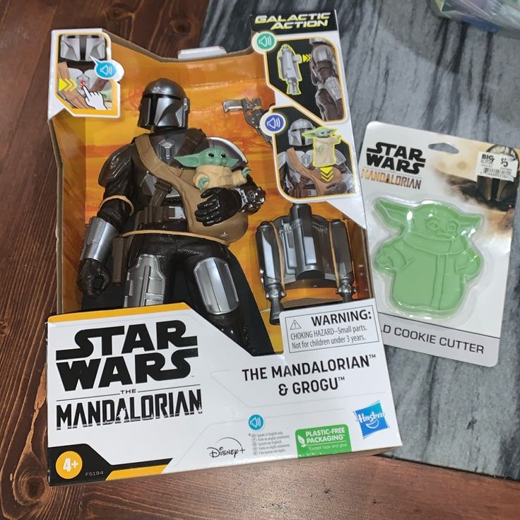 star wars the mandalrian action figure and yoda grogu toy in package