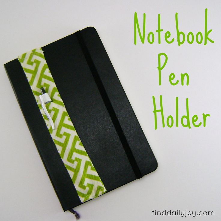 a notebook pen holder made out of black and green fabric with the words notebook pen holder on it