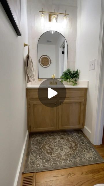 the bathroom is clean and ready to be used as a home decor piece in this video