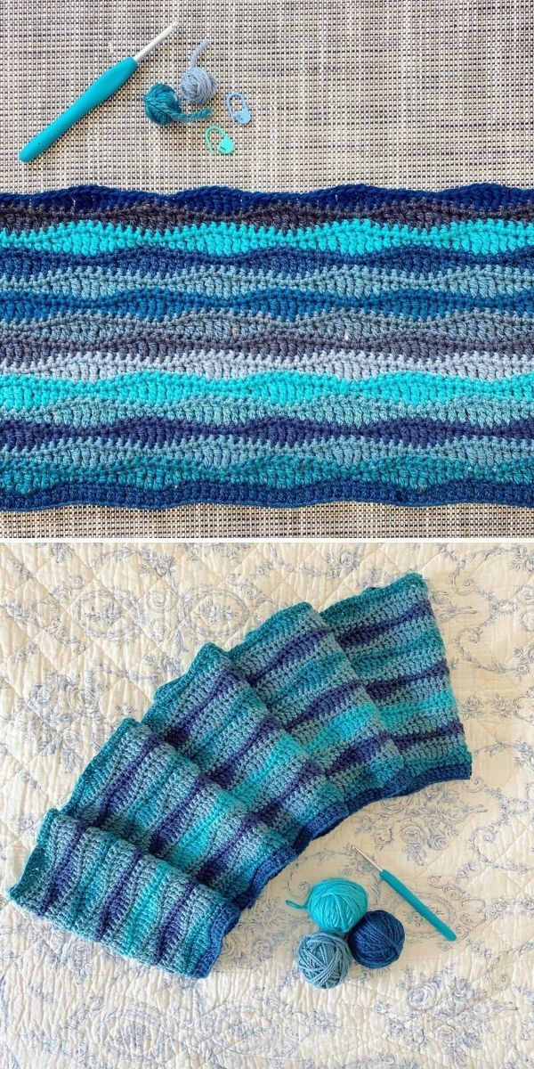 crocheted blue and green striped blanket next to knitting needles