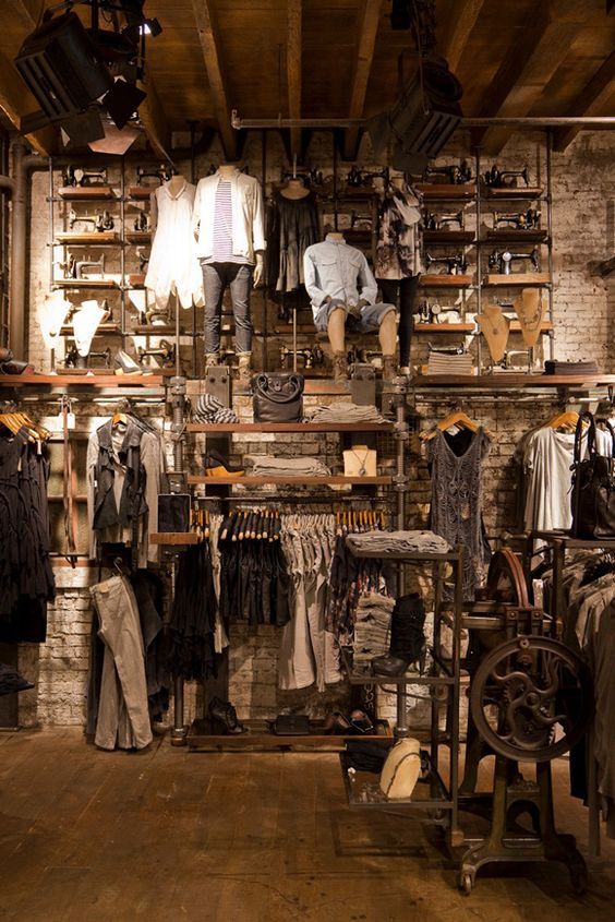 an old fashion shop with lots of clothes on display