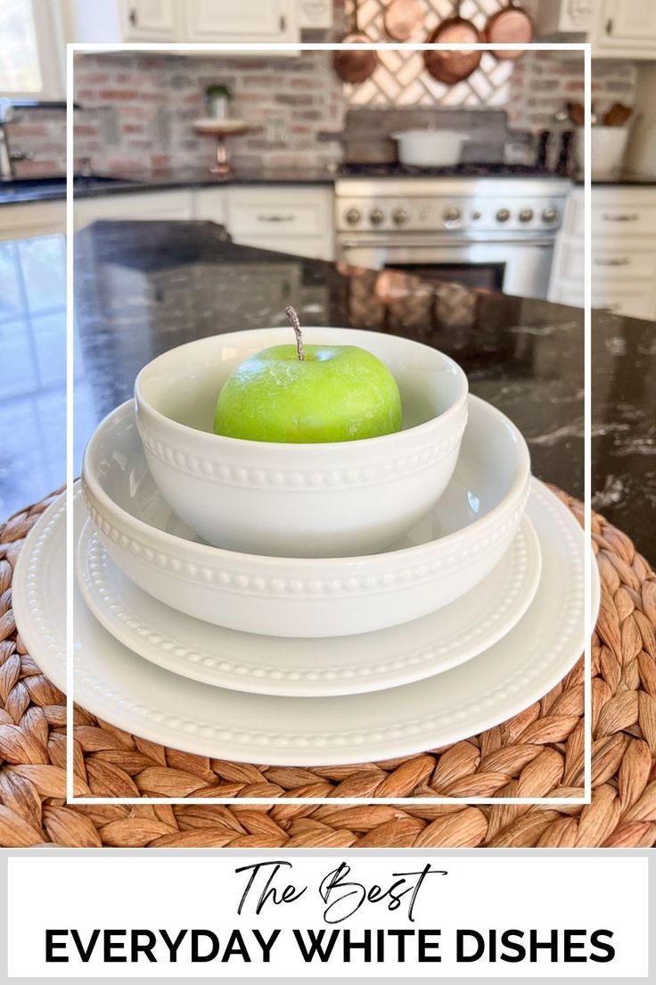 an apple sitting in a bowl on top of a plate with the words, the best everyday white dishes