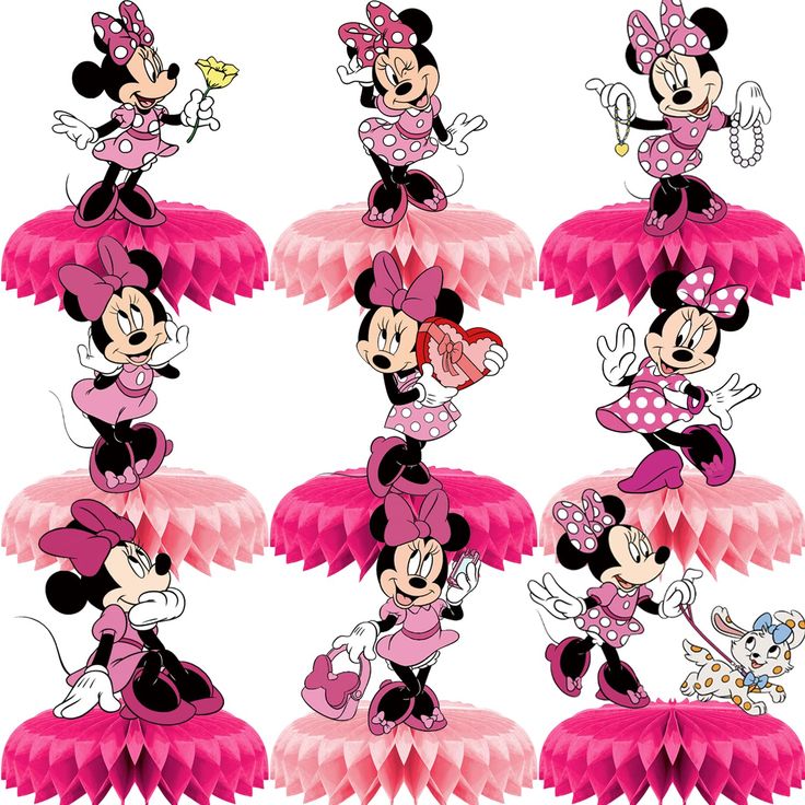 several minnie mouses are dancing together in pink tutues