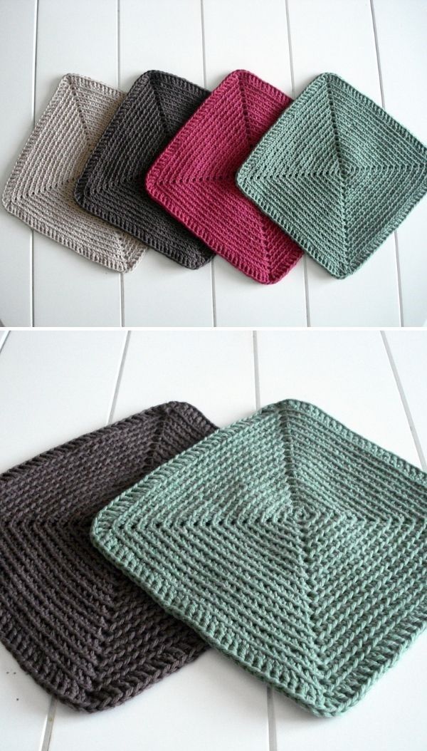 four knitted dishcloths are shown in different colors