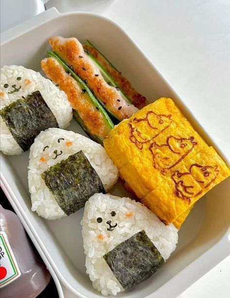 sushi with rice, asparagus and carrots in the shape of animals